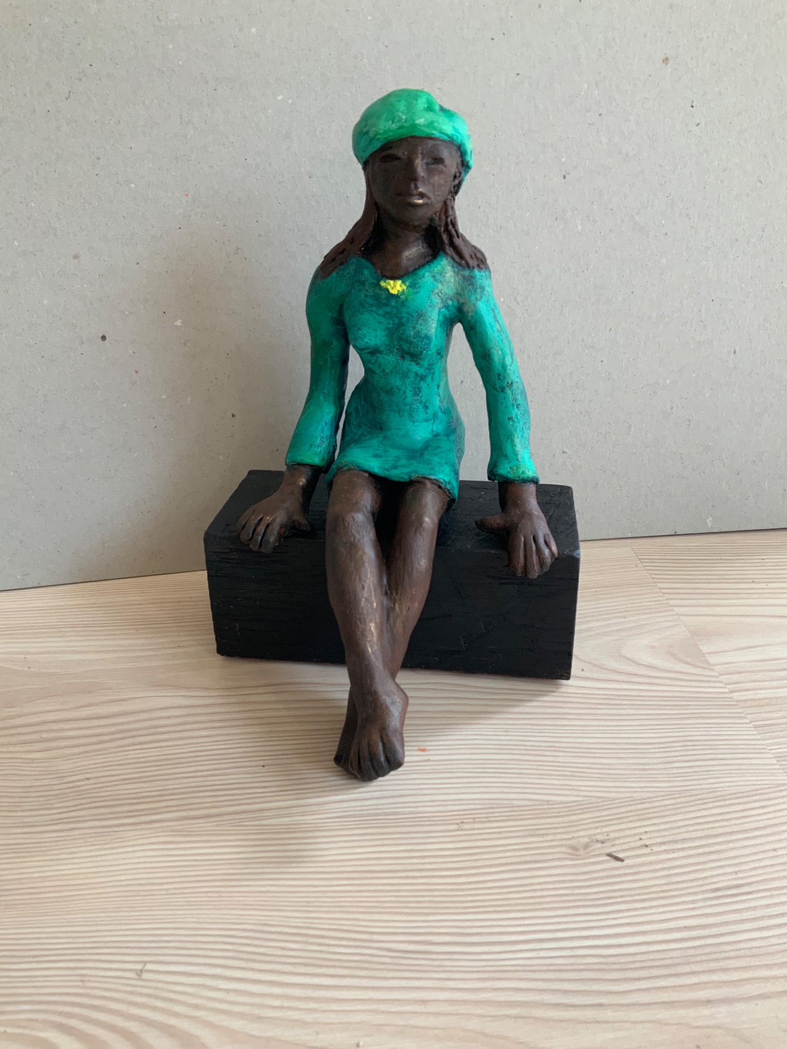 Zittende vrouw